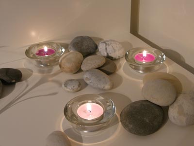 Candles and stones, part of a relaxing treatment from Cherish 